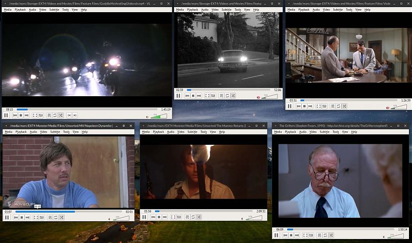 six different videos playing on a computer desktop